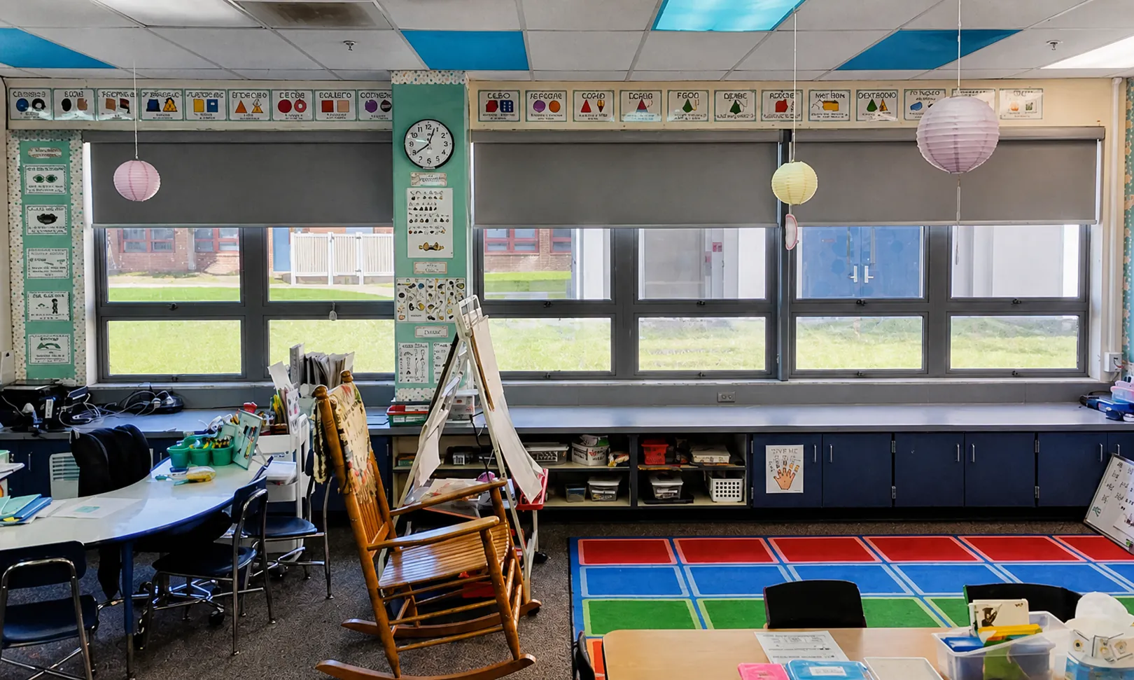 Commercial roller shades controlling daylight in a St. Augustine classroom