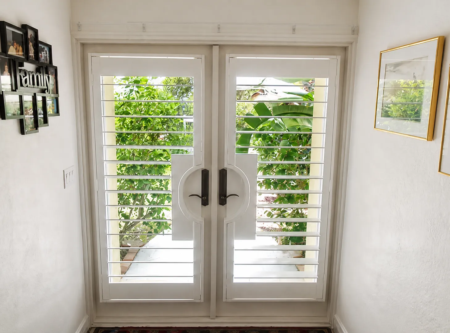 Custom plantation shutters fitted to French doors in St. Augustine